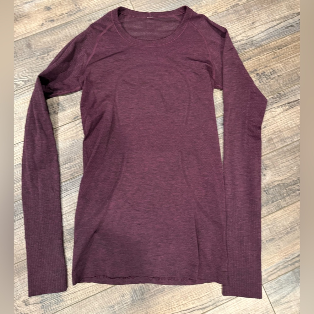 Women's Long Sleeve swiftly Purple Top size 6 like new